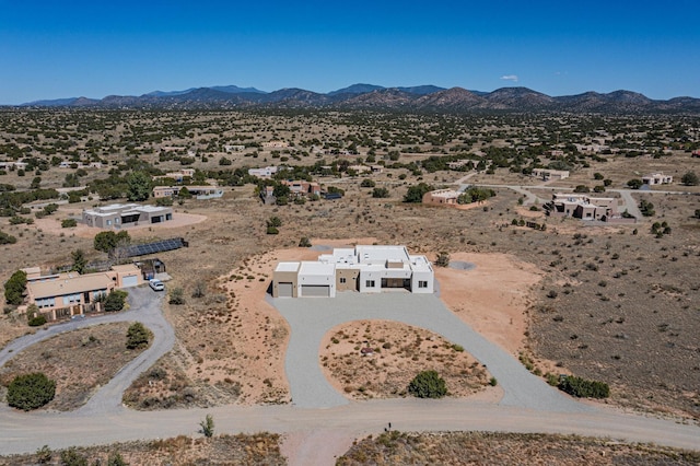 aerial view with view of desert and a mountain view