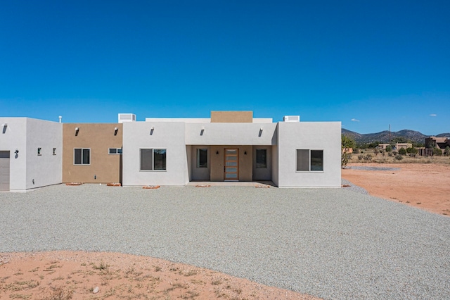 southwest-style home featuring a mountain view