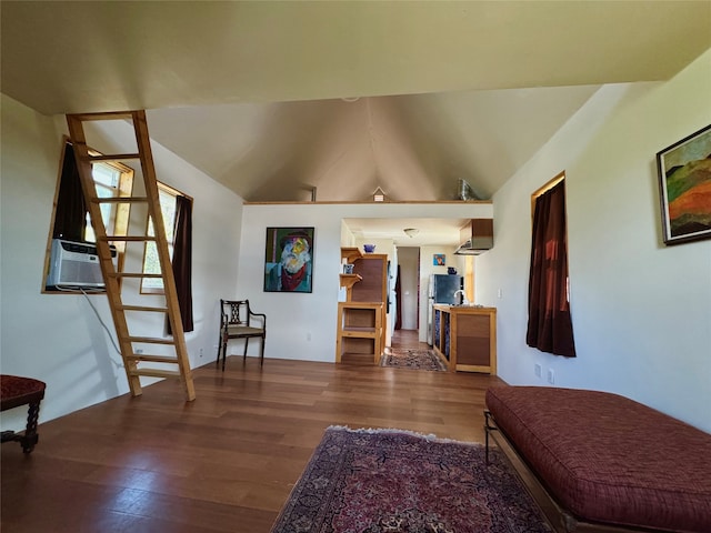 interior space with cooling unit and hardwood / wood-style flooring