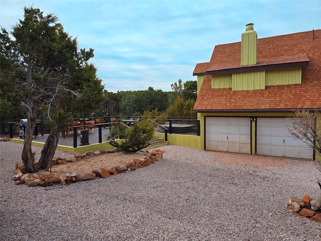 exterior space with a garage