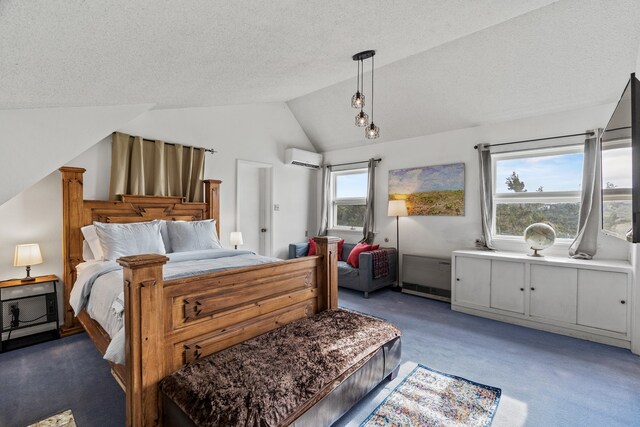 bedroom with a wall mounted AC, carpet, lofted ceiling, and a textured ceiling