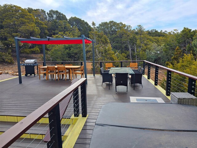 wooden deck with grilling area