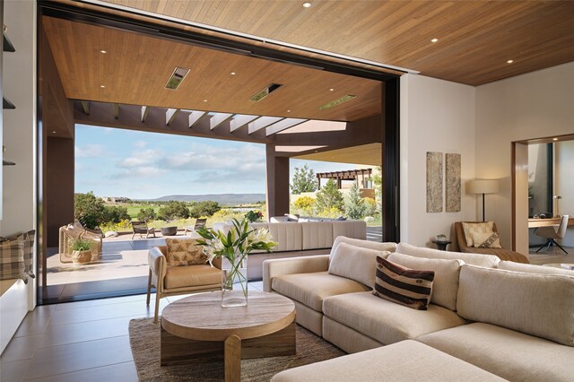 living room with wood ceiling