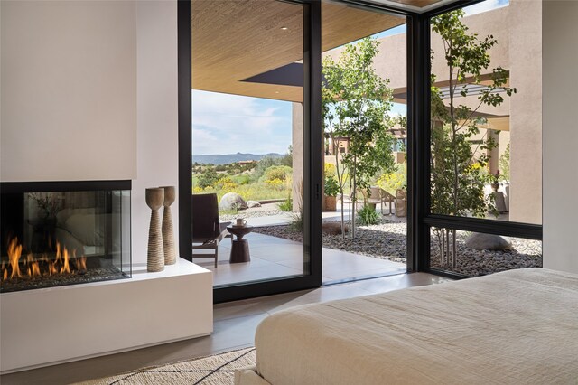 bedroom with a wall of windows