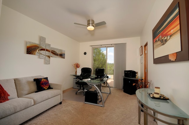 office area with ceiling fan and light colored carpet