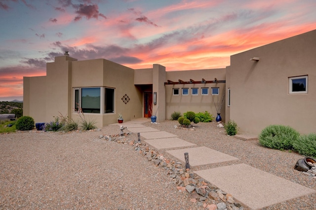 view of pueblo revival-style home