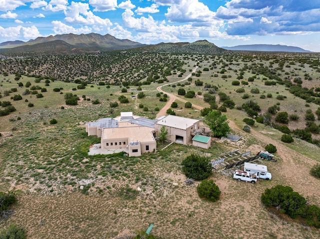 115 Waldo Mesa, Madrid, NM 87010 - drone / aerial view featuring a mountain view