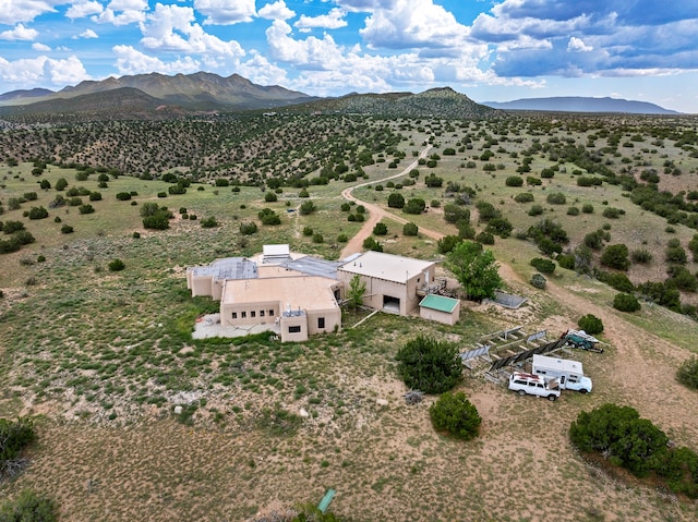 drone / aerial view featuring a mountain view