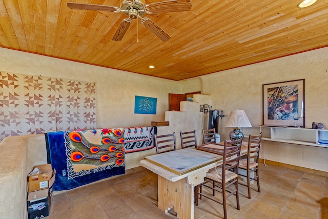 115 Waldo Mesa, Madrid, NM 87010 - tiled dining room featuring ceiling fan and wood ceiling