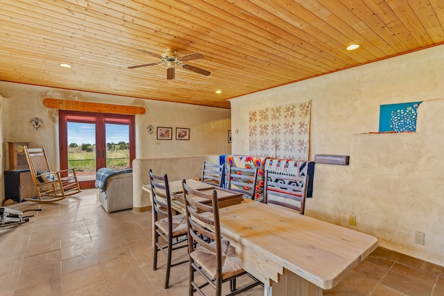 115 Waldo Mesa, Madrid, NM 87010 - dining room featuring ceiling fan, wooden ceiling, and tile patterned flooring