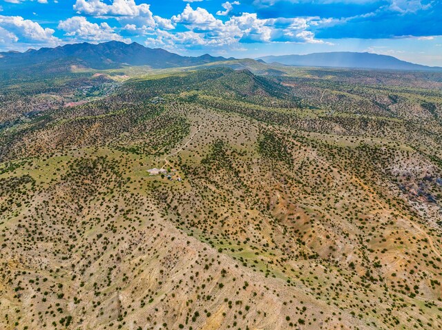 115 Waldo Mesa, Madrid, NM 87010 - drone / aerial view with a mountain view