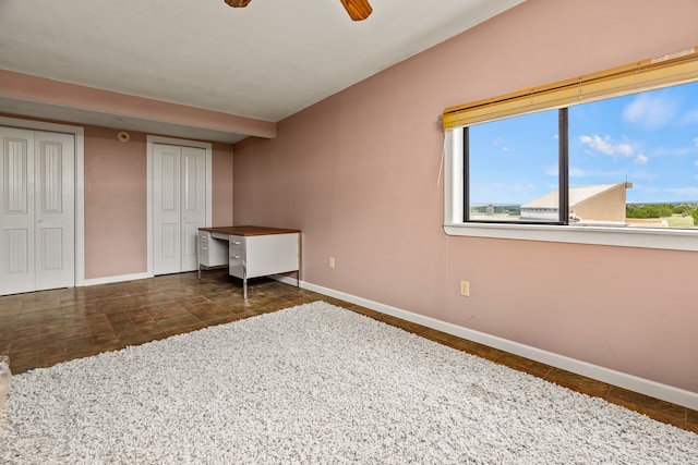 115 Waldo Mesa, Madrid, NM 87010 - unfurnished bedroom with ceiling fan