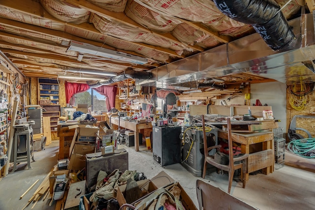 115 Waldo Mesa, Madrid, NM 87010 - basement featuring a workshop area