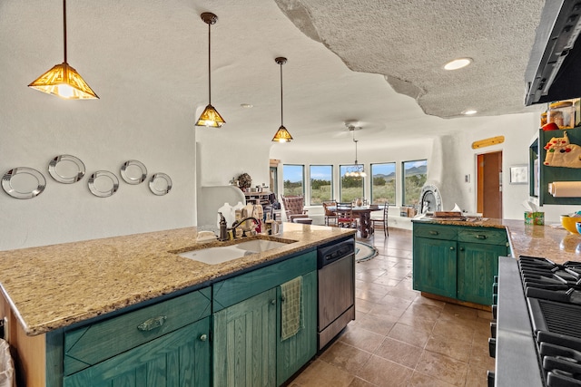 115 Waldo Mesa, Madrid, NM 87010 - kitchen featuring light stone counters, dishwasher, light tile patterned floors, decorative light fixtures, and sink