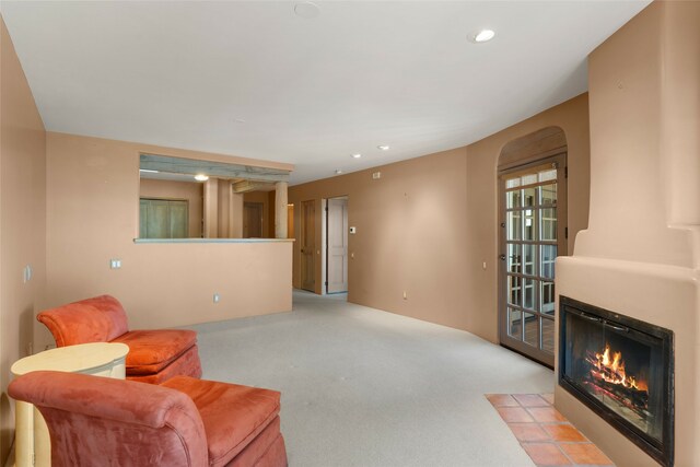 living room with light colored carpet