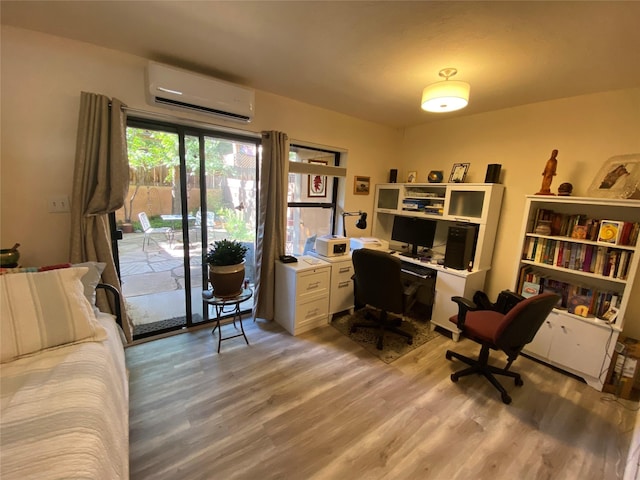 office space with hardwood / wood-style flooring and an AC wall unit