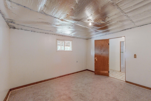 unfurnished bedroom with light colored carpet