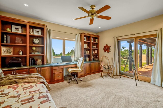 interior space with ceiling fan and a wealth of natural light