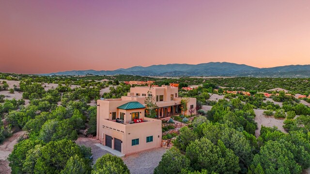 aerial view at dusk with a mountain view