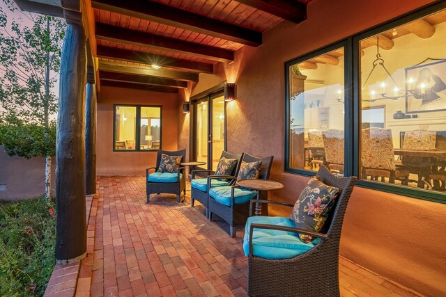 view of patio terrace at dusk