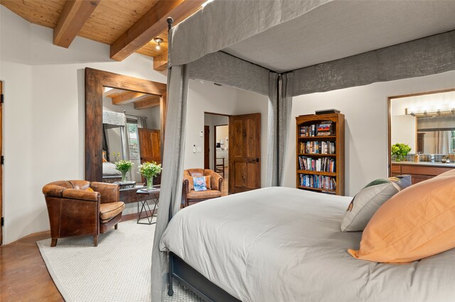 bedroom featuring beam ceiling