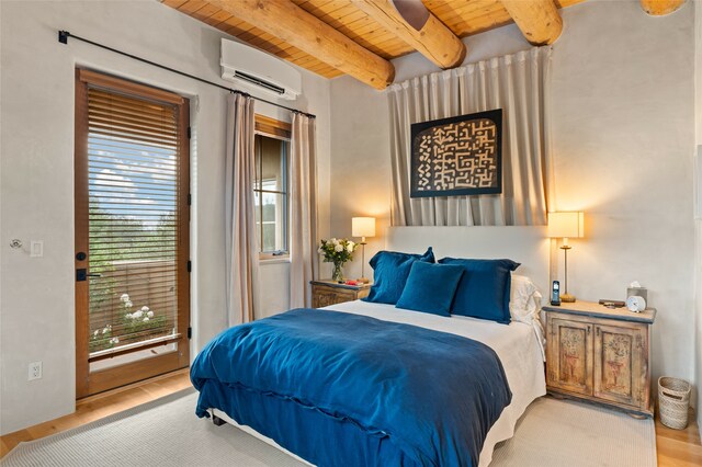 bedroom with a wall mounted air conditioner, beam ceiling, wood ceiling, and light hardwood / wood-style floors