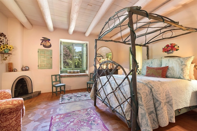 bedroom with beamed ceiling