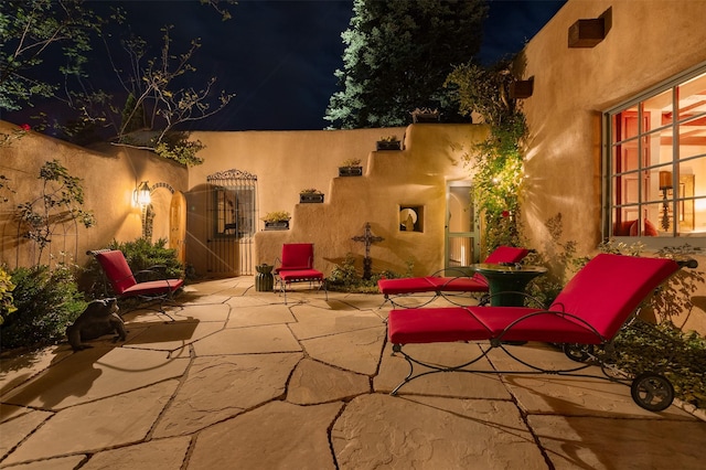 view of patio at twilight