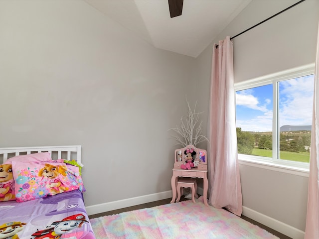 bedroom with vaulted ceiling and ceiling fan