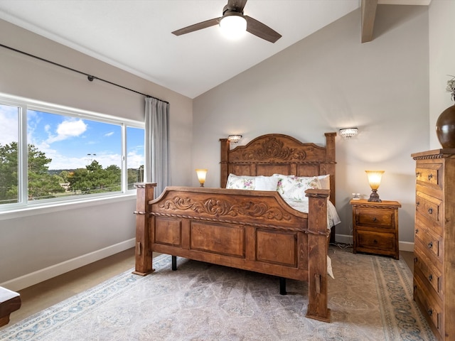 bedroom featuring ceiling fan, carpet flooring, and vaulted ceiling