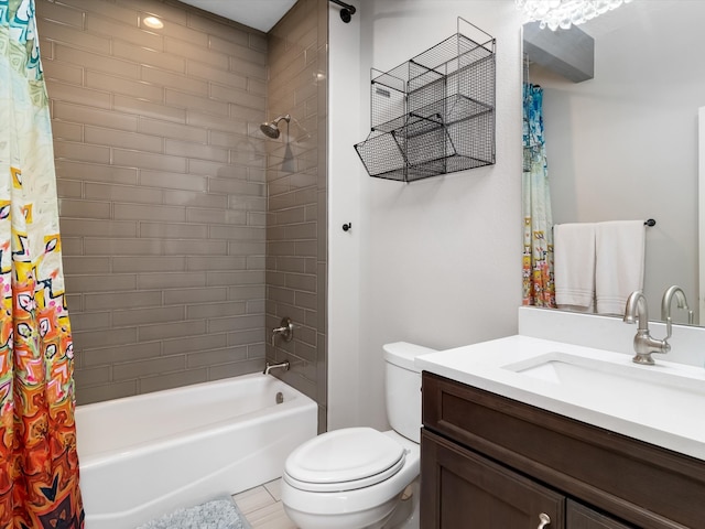 full bathroom featuring shower / tub combo with curtain, vanity, tile patterned floors, and toilet