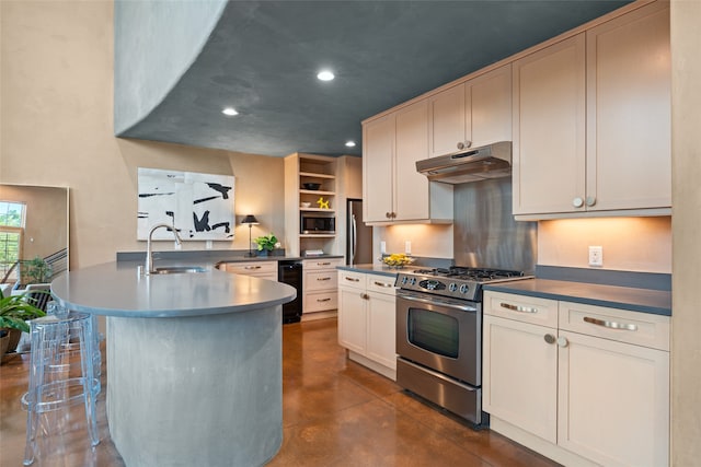 kitchen with white cabinets, sink, beverage cooler, a center island with sink, and stainless steel appliances