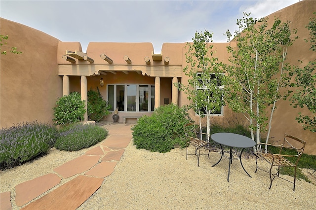 rear view of property with a patio