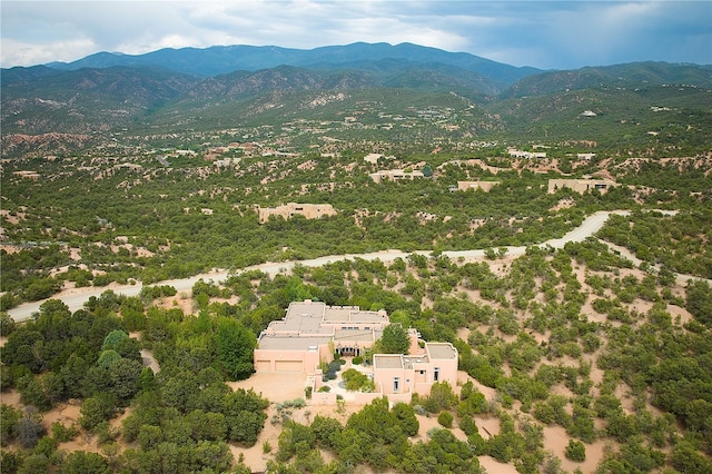 drone / aerial view featuring a mountain view