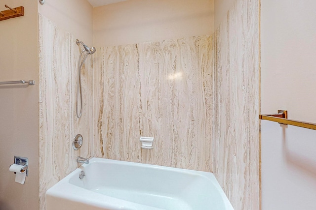 bathroom featuring tiled shower / bath combo