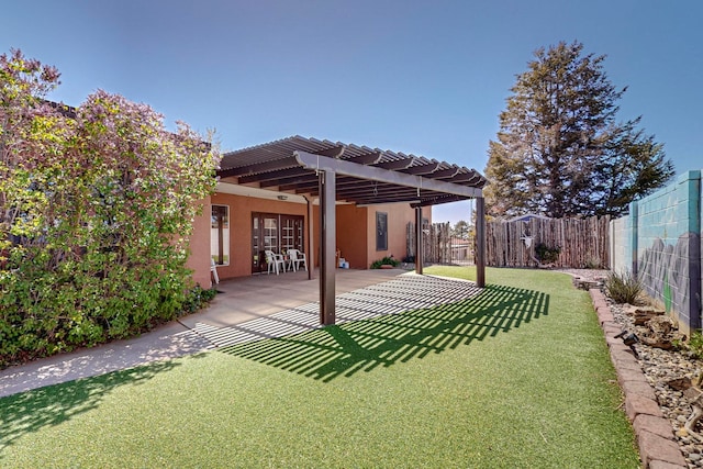 view of yard featuring a pergola and a patio area