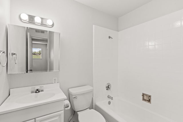 full bathroom with toilet, vanity, and  shower combination