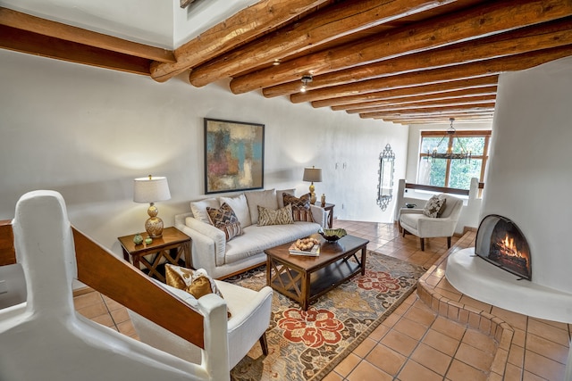 living room with light tile patterned flooring and beam ceiling