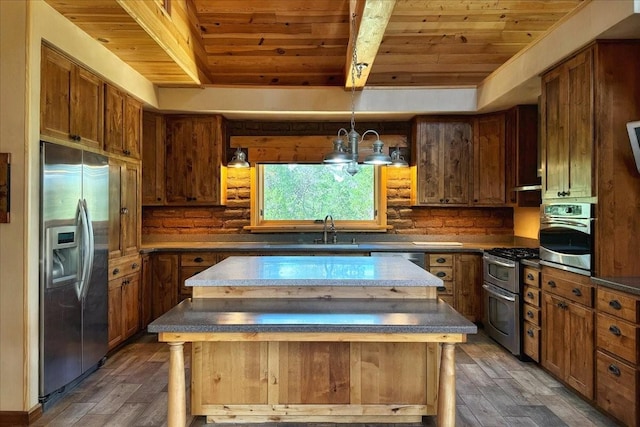 125 Tierra Del Dios, Rowe, NM 87562 - kitchen with wood finished floors, appliances with stainless steel finishes, wood ceiling, and a sink