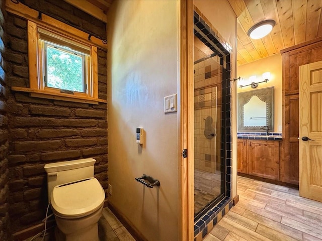 125 Tierra Del Dios, Rowe, NM 87562 - full bath with vanity, wood finished floors, a shower stall, wooden ceiling, and toilet