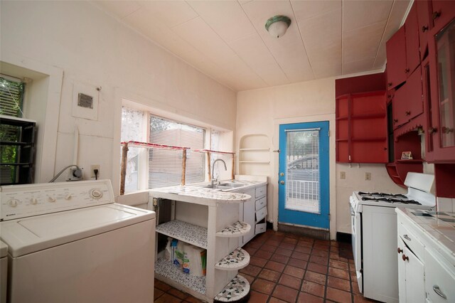 laundry area featuring washer / clothes dryer and sink