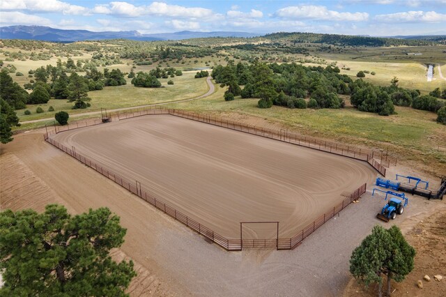 aerial view featuring a rural view and a mountain view