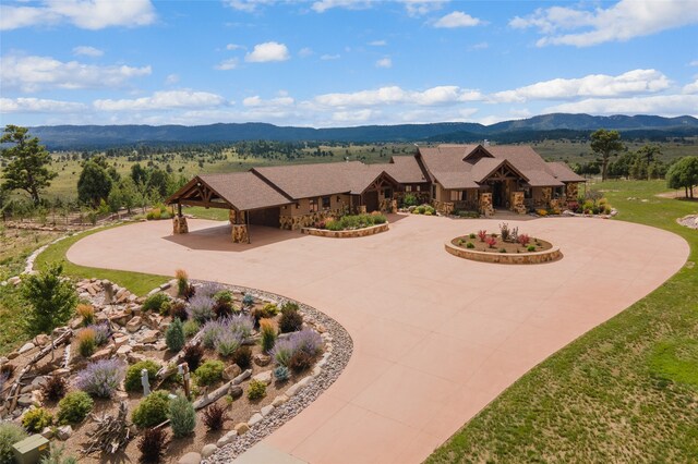 exterior space featuring a mountain view