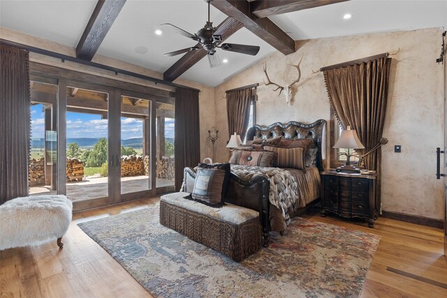 bedroom featuring vaulted ceiling with beams, french doors, light hardwood / wood-style floors, access to outside, and ceiling fan