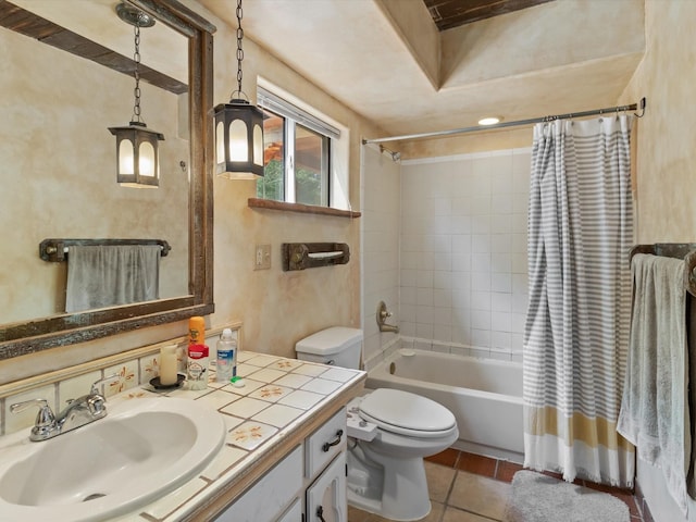 bathroom with tile patterned floors, toilet, vanity, and shower / bathtub combination with curtain