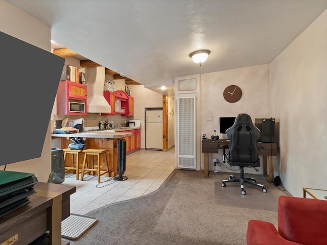 office area with light colored carpet and light tile patterned flooring