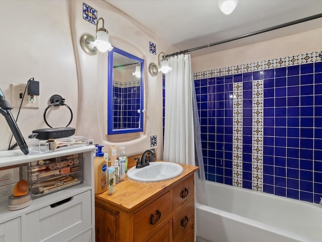 bathroom featuring vanity and shower / tub combo