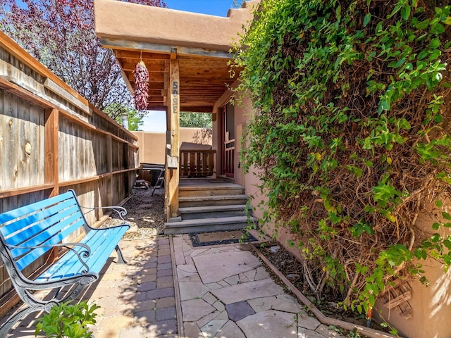 view of patio featuring fence