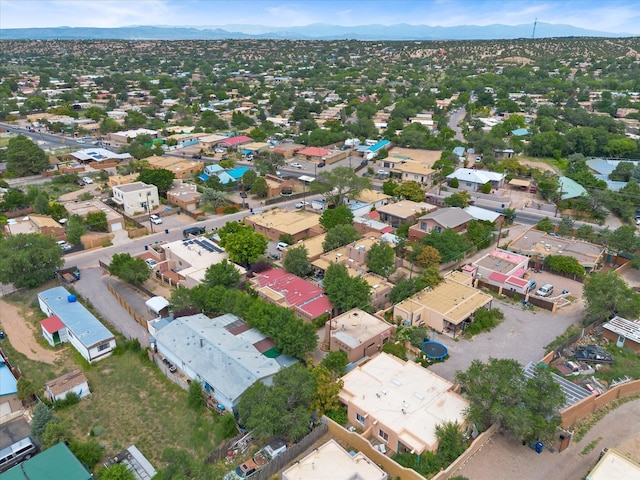 aerial view featuring a mountain view and a residential view