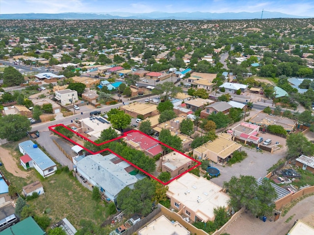 drone / aerial view featuring a mountain view and a residential view